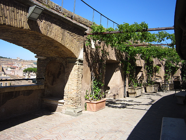 Arches from the walls, covered in green plants. Photo: Mittens and Sunglasses © 2016