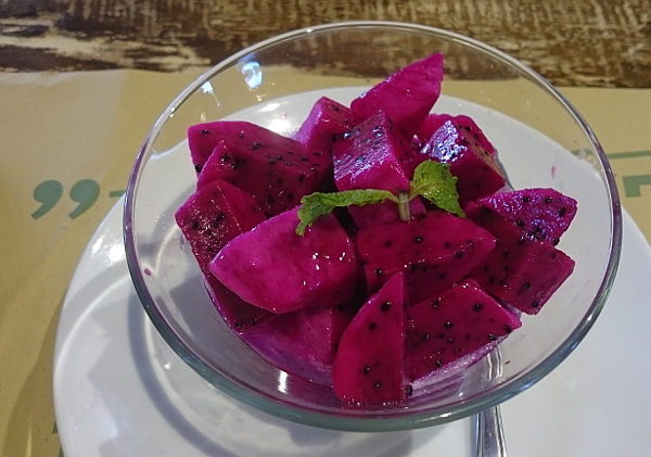 Red dragon fruit in a bowl
