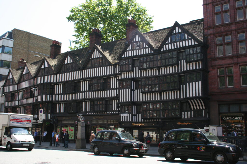 Old buildings of wood. Painted black and white.